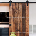 Movable plank panel wooden doors design catalogue surface stained sliding barn door for partition